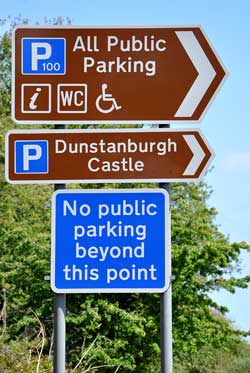 Parking sign on the approach to Craster